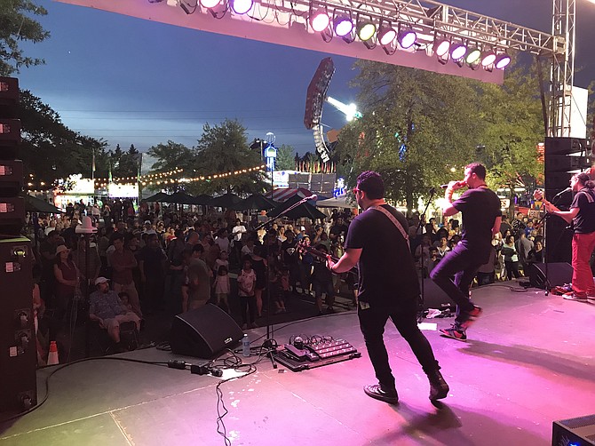 "Ocho de Bastos," the Latin pop band, 'unites the people through music' at the 2019 Herndon Festival.