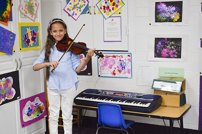 Geneva Alum Chloe Brokt, a 10 year-old violinist from Stone Ridge, traced love of her instrument to her earliest exposure to music at Geneva.