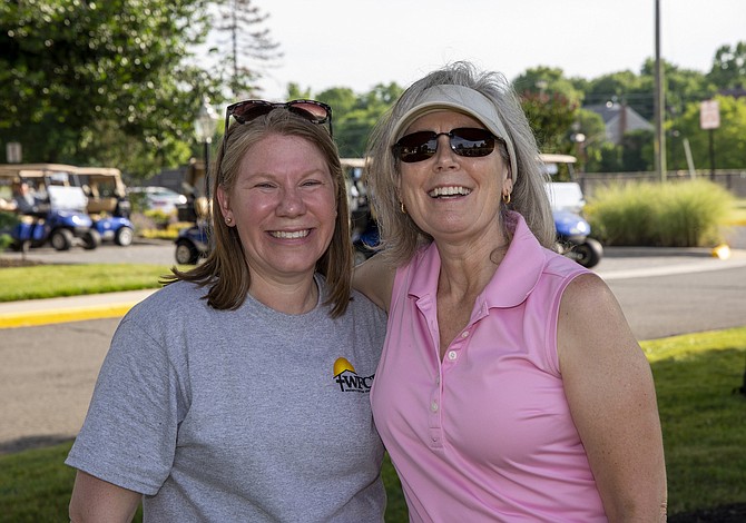 From left, WFCM’s Harmonie Taddeo and the Rev. Lynn Miller of King of Kings Lutheran Church. Miller golfed and gave the blessing at the event.