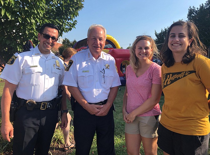 Sheriff Dana Lawhorne, second from left, with APD Capt. Shahram Fard, and Lawhorne’s daughters Megan and Mallory during National Night Out Aug. 6 at Charles Houston Rec Center.