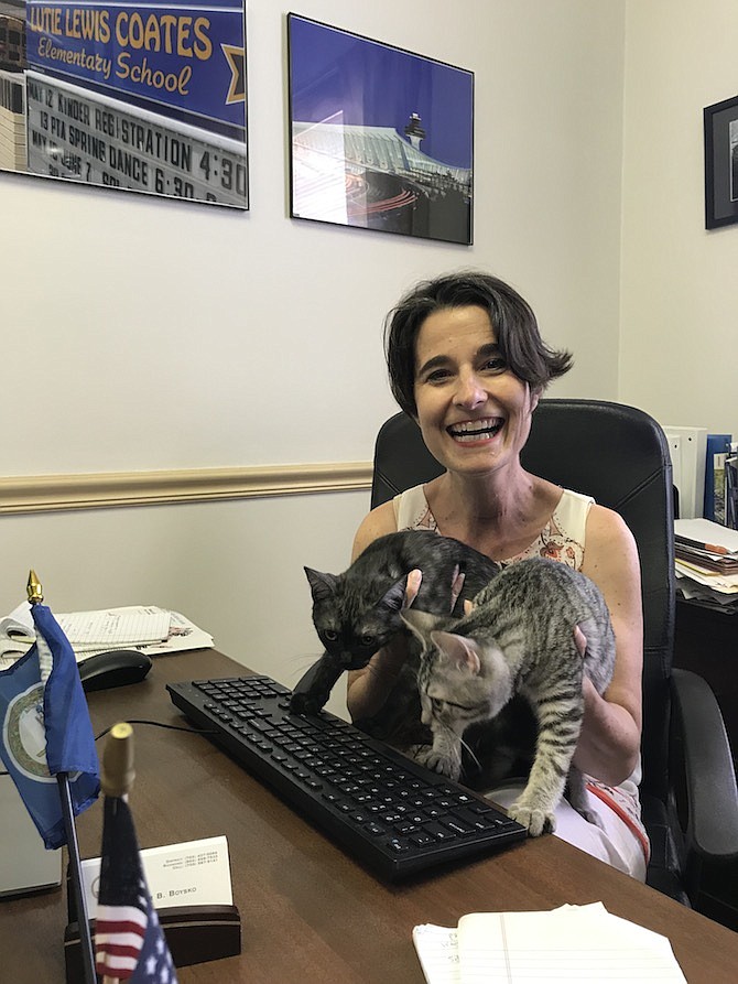 Virginia State Sen. Jennifer Boysko (D-33) of the Town of Herndon gets some keyboard assistance from her two rescue kittens she recently adopted.