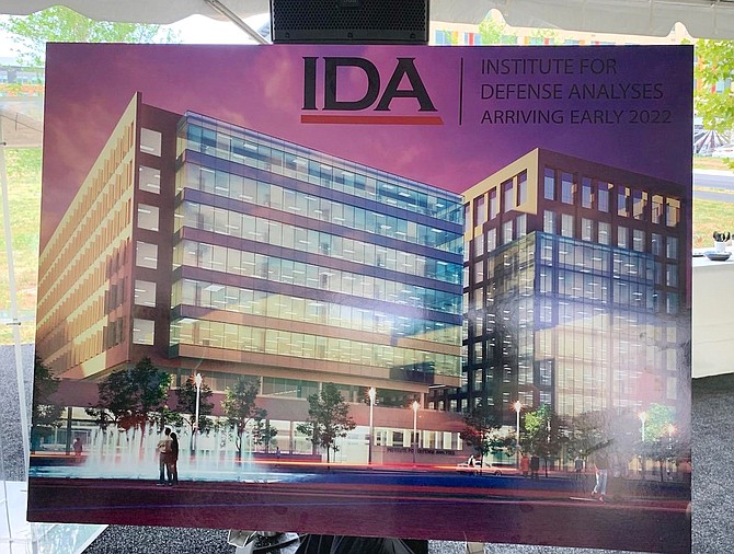 An architectural rendering of the Northeast view of the planned IDA headquarters on display during the Aug. 13 groundbreaking at Potomac Yard.