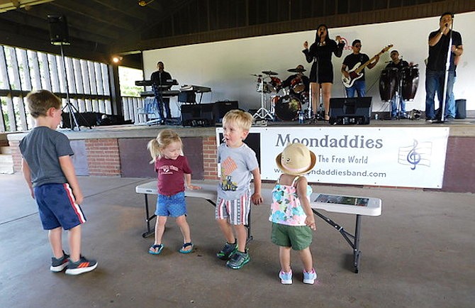 Children enjoy dancing to Moondaddies.