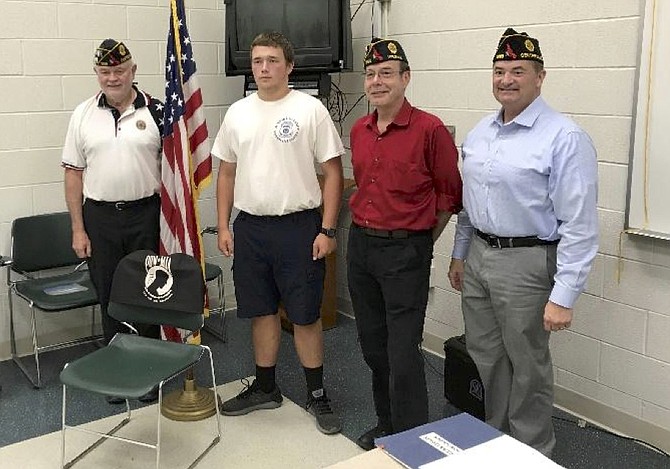 From left: Post Commander Steve Hunter, Russell Desrosier,  Sergeant-at-Arms Mark Miller, and member Warren Benson.