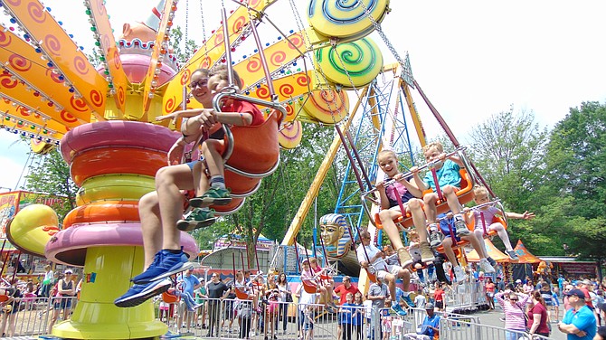 Sponsored by the McLean Community Center, McLean Day is held on the third Saturday in May. The Lolly Pop Swing at McLean Day 2019.