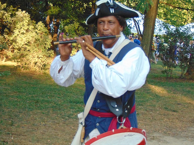 Don Francisco, in traditional costume, part of “Patriotic Fife, Flute, Whistle, Panpipes & Drum: A historical musical presentation.”