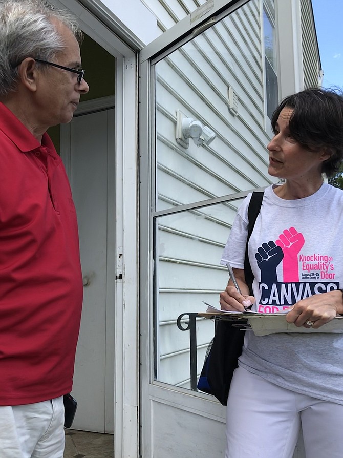 Virginia Sen. Jennifer Boysko (D-33) speaks with a constituent in her district, Krishna Khanal of the Town of Herndon, during the Aug. 24-25 Canvass for Equality.