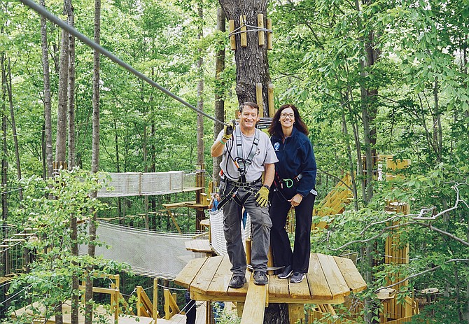 Supervisor Pat Herrity enjoys the GoApe Course at South Run REC Center.