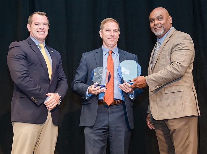 Police Chief David Huchler of the Metro Washington Airports Authority Police Department receives the 1st Place Award in the 2019 Virginia Law Enforcement Challenge Special Law Enforcement category from 2018-19 VACP President Chief Doug Goodman, Ashland Police and Virginia Deputy Secretary of Public Safety & Homeland Security Ryant Washington.