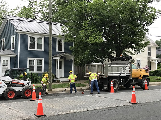 Employees of the Town of Herndon Department of Public Works in action.