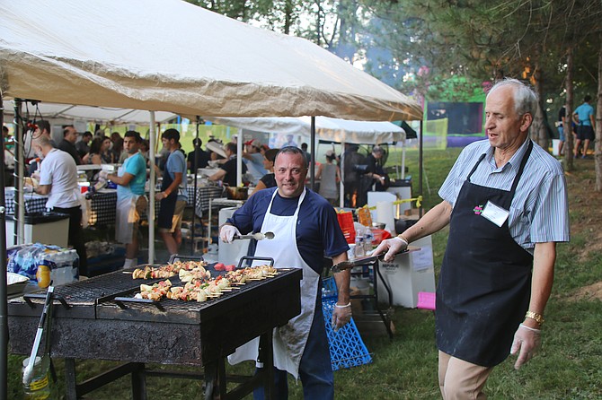 Fred Tabash and Daniel Valentini are on grill duty.