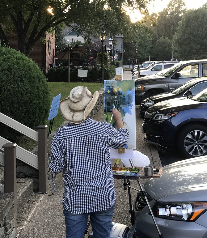 Artist Jill Banks, 2018 Paint Great Falls 1st Place Winner, paints in “plein air” in the Village Centre.