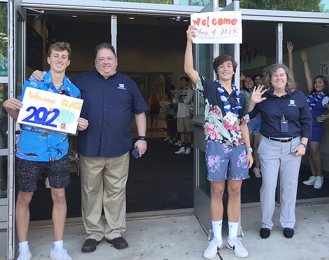 Enthusiastic students welcome back peers for #APSBack2School. Ready for first day @GeneralsPride @WLHSIBProgram. The class of 2020 will be the first class to graduate from renamed Washington-Liberty.