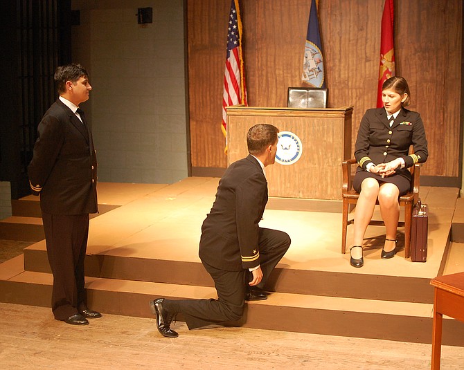 From left to right: Jonathan Mulberg (Lt. J.G. Sam Weinberg), Brendan Quinn (Lt. J.G. Daniel Kaffee), and Emma Wesslund (Lt. Cmdr. Joanne Galloway) star in “A Few Good Men.”