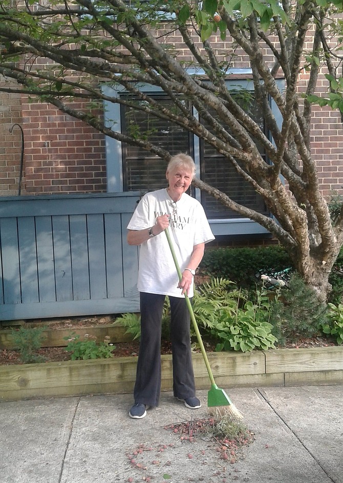 Rev. Dr. Kay Rodgers of Reston sweeps fruit that has dropped from her Japanese dogwood tree, so her neighbors and their pets don’t step on the red berries and track them into their townhomes.  Although she completes this ordinary chore each fall, she finds it unusual that her tree drops its fruit in mid-August.