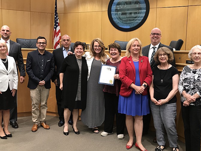 Mayor of the Town of Herndon, Lisa C. Merkel, and the members of the Town Council present a Proclamation to recognize the 130th Anniversary of the Herndon Fortnightly Club.