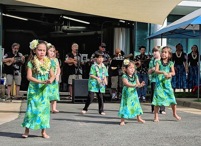 Children performing the hula at last year’s anniversary.