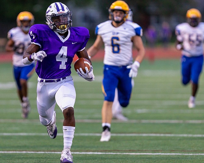 Chantilly RB Darius Clark #4  outruns the defense of Osborn Park enroute to his first of two touchdowns.