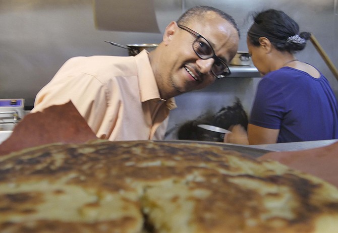 Bread is served with every dish and used traditionally instead of a fork at Enat.