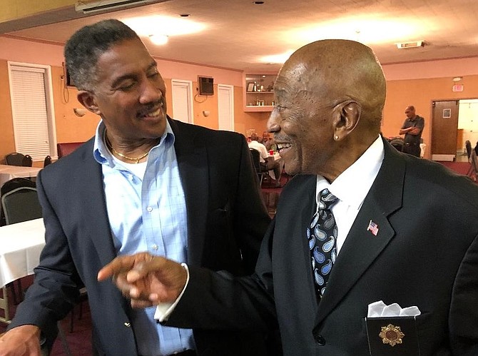 Former City Councilman Willie Bailey chats with Jim Henson at the Sept. 27 Departmental Progressive Club’s annual open house.