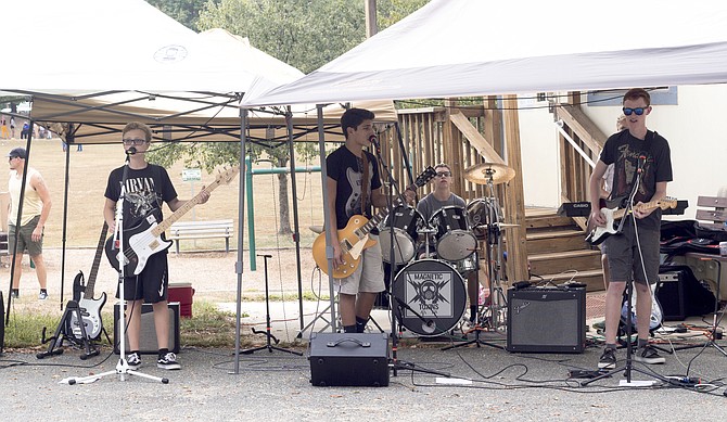 Band, Magnetic Toxins, plays for volunteers during the event.