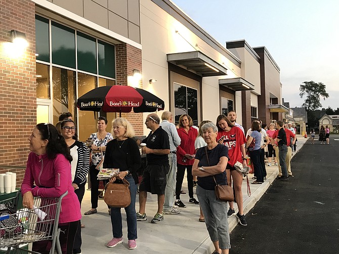 Sprouts’ first customers line up in Herndon ready to experience 20,000 products, 2,400 of which are private label or Sprouts brand.