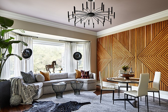 Alexandria-based designer Quintece Hill-Mattauszek designed this “Boys Club” space using vintage finds.