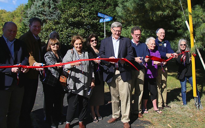 Fairfax County officials and Great Falls residents are happy to open a new segment of the pedestrian walkway from Falls Bridge Lane to Seneca Square along Georgetown Pike.