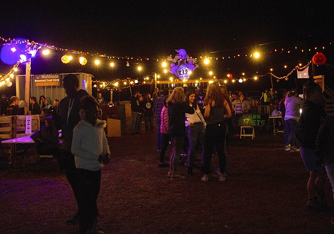 Kids enjoy the ballfield filled with food, drinks and activities.