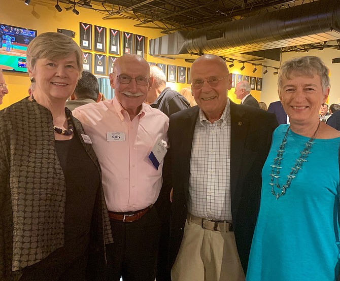 Senior Services of Alexandria Executive Director Mary Lee Anderson, left, poses for a photo with Gerry Cooper and Patrick and Bobbi O’Brien at the annual SSA Oktoberfest Oct. 15 at Port City Brewing Company.