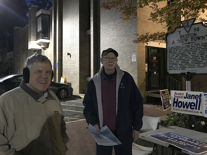 The first voter of the day arrives at Polling Place Reston Community Center-Lake Anne, 1609-A Washington Plaza, in the Lake Anne Plaza parking lot at 6:01 a.m.