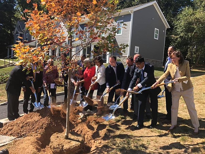 Scotland Community grand reopening Sept. 25, with Christine Madigan, Executive Vice President of Development, Acquisitions and Asset Management – Enterprise Homes; Roderick Simpson, Senior Planning Specialist, Montgomery County DHCA; Aseem Nigam, Director, Montgomery County DHCA; Miles Cary, Senior Vice President – Bank of America; Andrew Friedson, District 1 Councilmember; Lily Qi, D15 Delegate; Scotland Community Board Member; Will Jawando, At-Large Councilmember; Scotland Community Board Member; Hans Riemer, At-Large Councilmember; Scotland Community Board Member; Brien O’Toole, Deputy Director, Rental Lending, Maryland DHCD; Brian McLaughlin, President & CEO, Community Preservation Development Corporation; Enterprise Homes, Inc.