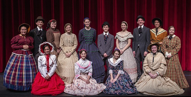 The cast of “Little Women” (kneeling in front L to R): Sofia Cruz (Annie), Melanie Becker (Amy), Sophie de Waal (Meg), and Allison Dunnegan (Sallie); (standing in back L to R): Maya Andersen (Aunt March), Owen Peters (Theodore Lawrence), Caroline Coffin (Hannah), Samantha Fisher (Beth), Kathleen McNerney (Marmee), Andrew Comlish (Mr. March), Dagny Scannell (Jo), Patrick Byrns (John Brooke), Janet Le (Mrs. Gardener), and Quinn Doyle (Belle).