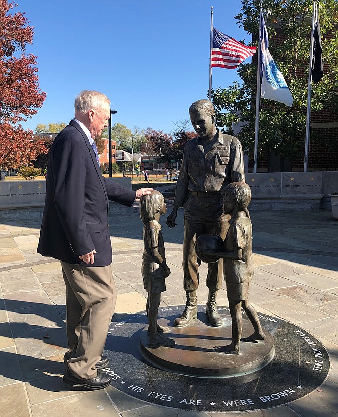 USN Capt. Eugene “Red” McDaniel (ret.), pays his respects at the Captain Rocky Versace Plaza and Vietnam Veterans Memorial Nov. 6 in Del Ray. McDaniel spent six years as a POW at the “Hanoi Hilton” during the Vietnam War. A Veterans Day ceremony will be held Nov. 11 at 1 p.m. at the Rocky Versace Plaza.