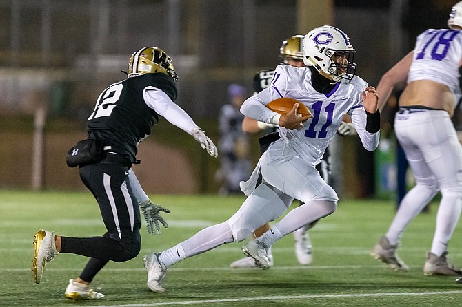 Tyler O’ Reilly rushes for positive yardage.