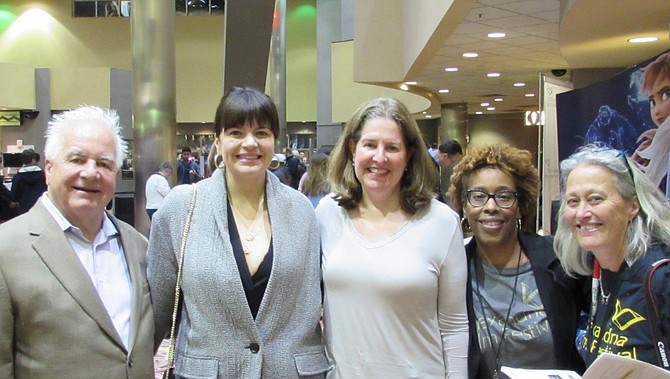 T.C. Williams High School graduate and former Saturday Night Live cast member Casey Wilson, second from left, poses for a photo with her father, Paul Wilson, Allison Silberberg, festival vice chair Dara Sanders and chair Margaret Wohler at the closing night of the Alexandria Film Festival Nov. 10 at the AMC Hoffman Center Theaters. Wilson screened her film “Daddio” at the festival.