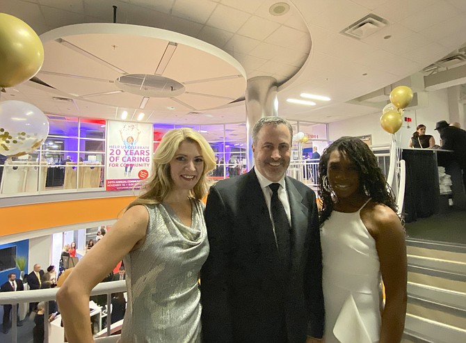 Restonians Taralyn Kohler, Executive Director CORE Foundation; Doug Bushée, Founder of CORE Foundation; and Traci Waller, pictured during the Opening Reception of the YMCA Fairfax County Reston 20th Annual Fundraising Gala.