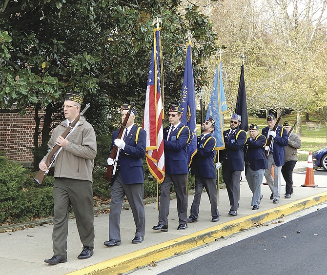 The American Legion Post 177 Color Guard begins Fairfax City’s Veterans Day celebration.