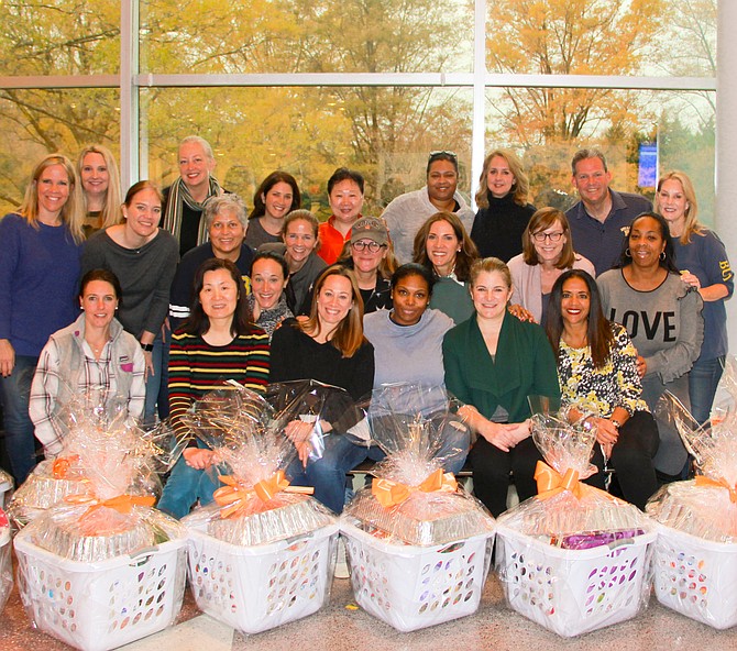 Parents Association Members assemble baskets.