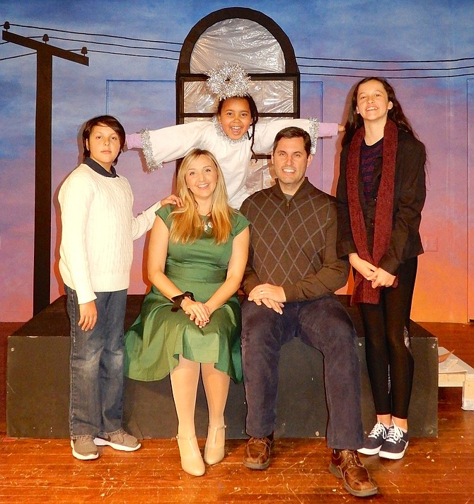 The play’s cast includes Lilith Nees (the angel) and (front row, from left) Thomas Kennedy, Mindy Thomas, Gregory Kennedy and Mary Kennedy.