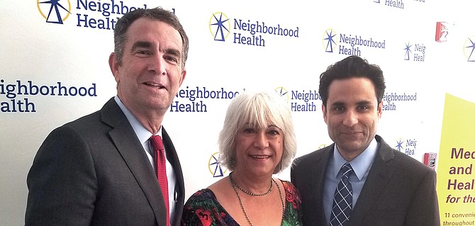 Nora Partlow with Gov. Ralph Northam and Dr. Basim Kahn, executive director of Neighborhood Health.