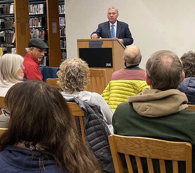 Author Michael T. Klare answers questions during the book discussion for his newly released examination of climate change, "All Hell Breaking Loose," held at Reston Regional Library Nov. 14.