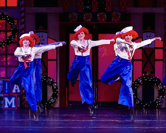 From left, Becca Perron, Kendra Walsh and Vilas Iyer performing in the show as Raggedy Ann and Andy dolls.