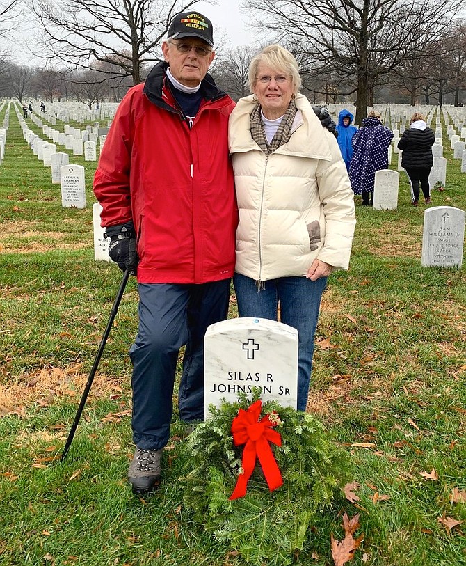 Jim Mogle, a U.S. Navy Vietnam veteran, and Nancy Mogle of Leesburg placed a wreath at Nancy's father's grave in Section 60 of Arlington National Cemetery during Wreaths Across America Dec. 14.  CAPT Silas R. Johnson Sr. was a pilot in the U.S. Navy for 32 years and served in WWII, Korea and Vietnam.