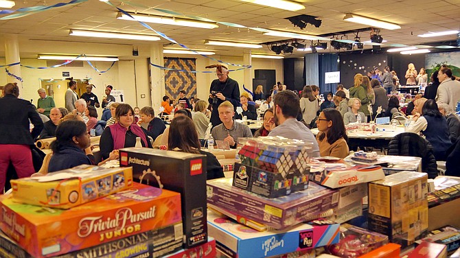 More than two hundred volunteers pack St. Andrew's Episcopal Church on Dec. 11 to wrap presents for 300 children who have parents incarcerated locally.