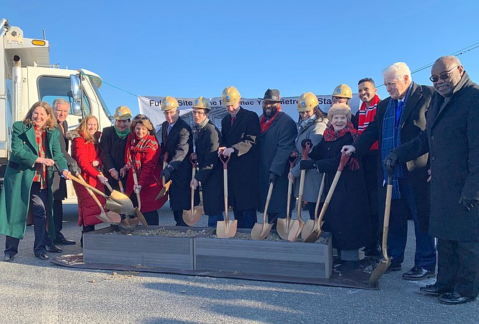 Virginia Gov. Ralph Northam (D), center, is joined by current and former city officials and staff at the Dec. 19 groundbreaking for the future Potomac Yard Metro Station, scheduled to open in 2022.