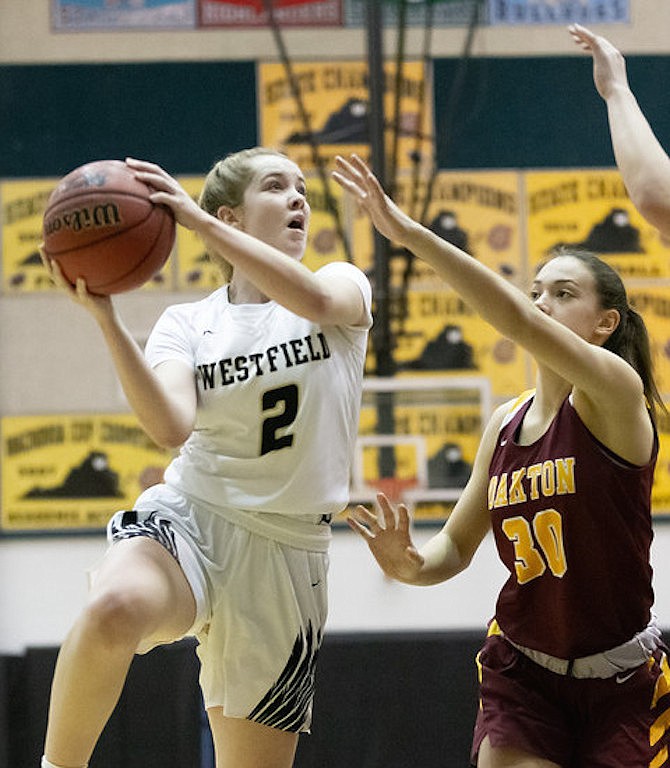 Victoria D’Ercole looks for her shot as she drives to the basket.