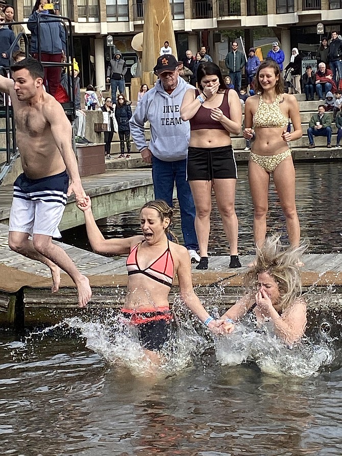 Participants in Camp Sunshine's 2020 Virginia Polar Dip take the plunge.