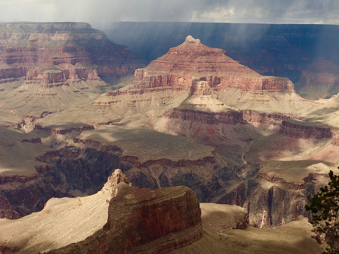 ‘Grand Canyon Rainstorm,’ by Dee Leggett, captures the drama of the dark sky and subtle texture of the rock formations.  This photo will be on display at the TD Bank in Great Falls through Feb.  29, 2020.