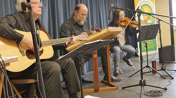 Simon’s Junction entertains the crowd at Empty Bowls with some toe-tapping bluegrass.